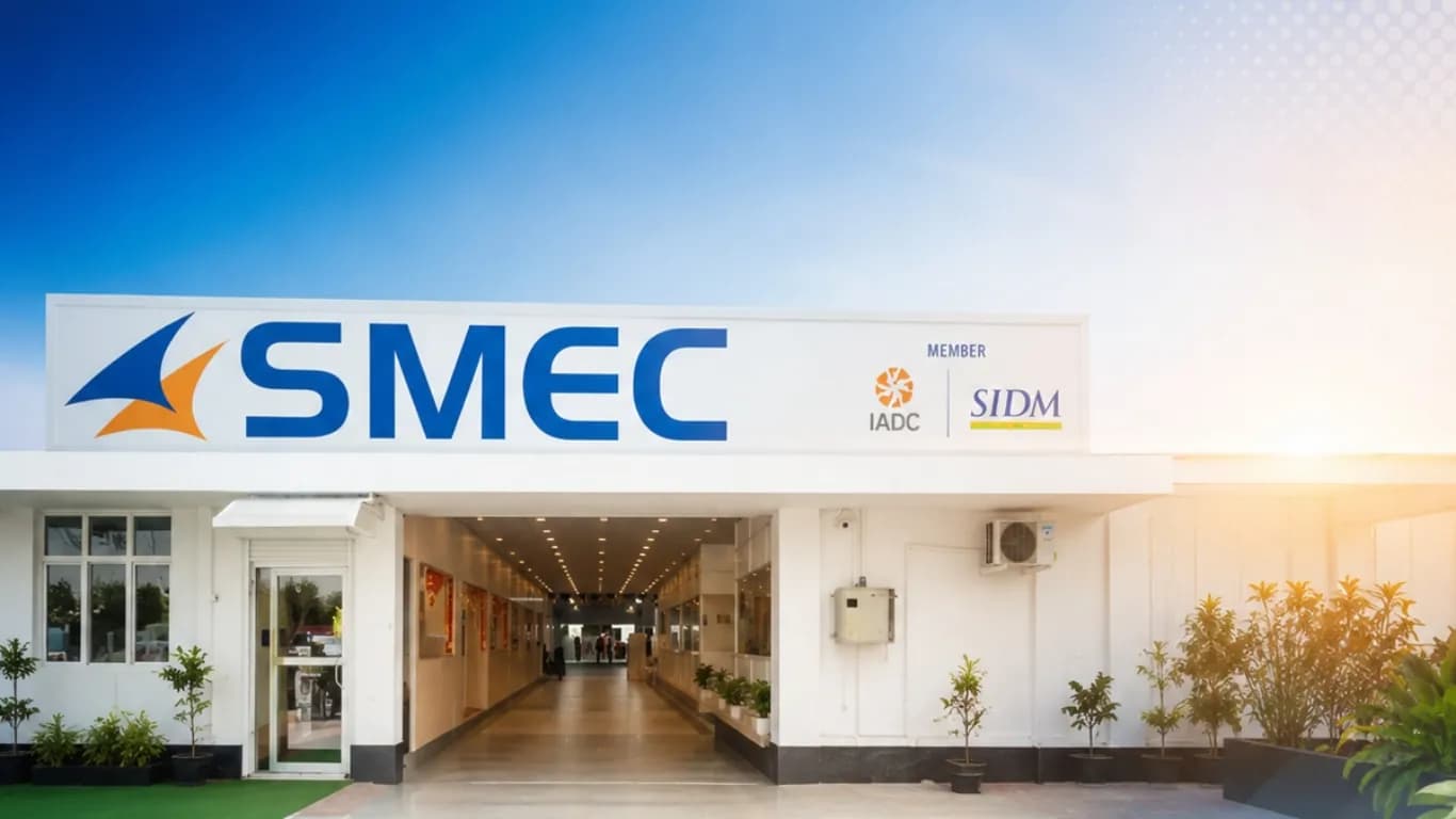 The entrance of the SMEC building, its sign carrying the SMEC logo with IADC and SIDM membership marks